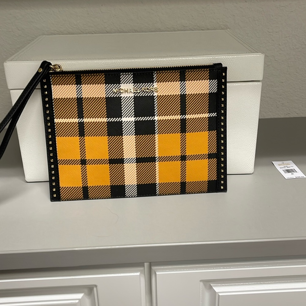 MK wristlet clutch bag.  New …. Never used